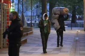 French police clear migrant camp near Paris city hall before Olympics